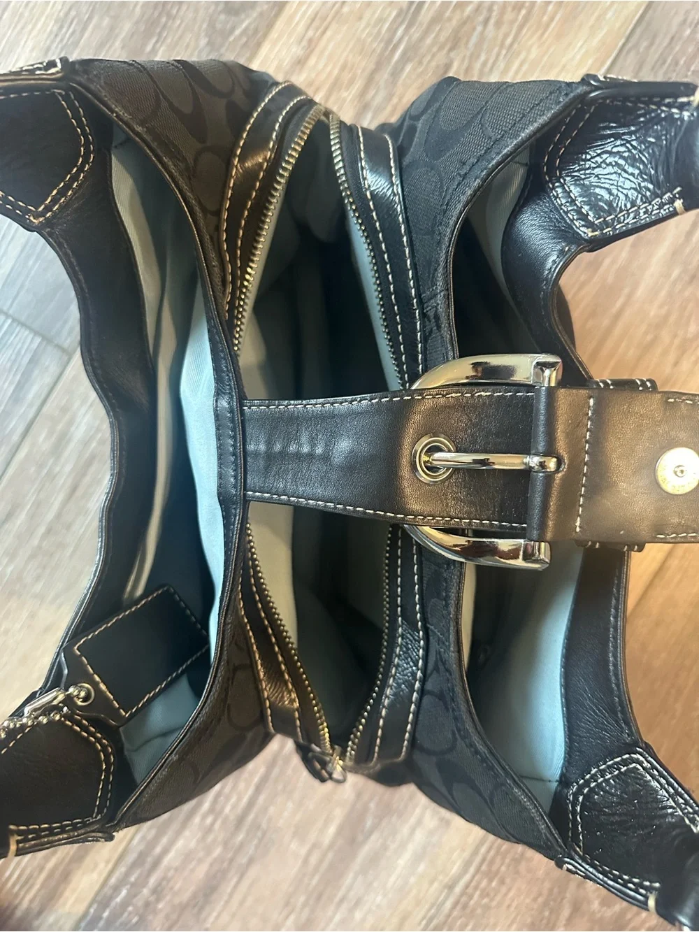 Coach Black SoHo Lynn Signature Hobo Bag with Buckle Accent